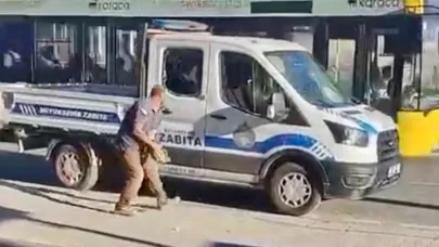 ZABITA ARACINA KALDIRIM TAŞI İLE SALDIRDI